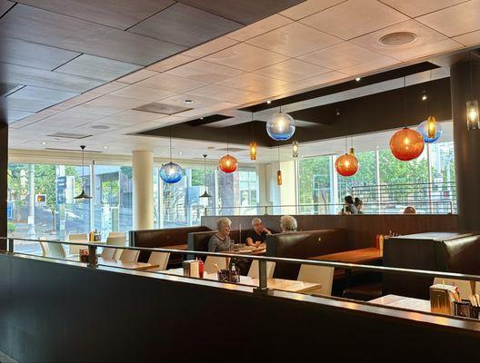 Looking out over the restaurant area, with windows facing 6th Ave.