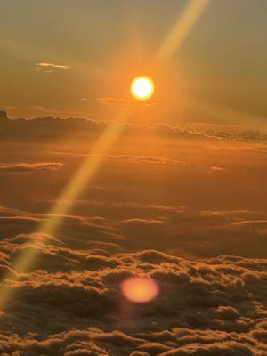 Sunset at 10,000 plus feet in Hawaii above the clouds