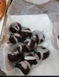 The chocolate donut holes with frosting