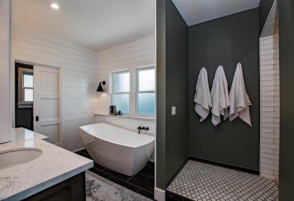 Bathroom in a Zieba Builders Master Suite Addition! Freestanding tub and open walk-in shower, shiplap walls