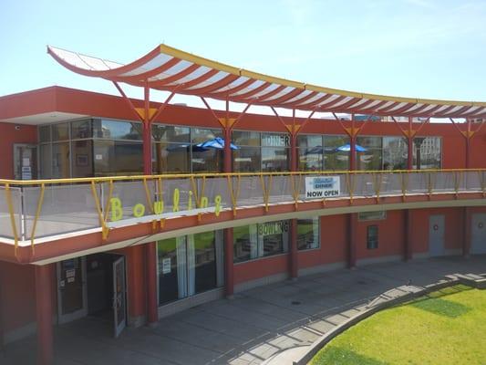 The food is on the upper level. The bowling alley is below.