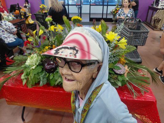 Veggie flower arrangement and Mama Bea in the line the first day 9/26/25