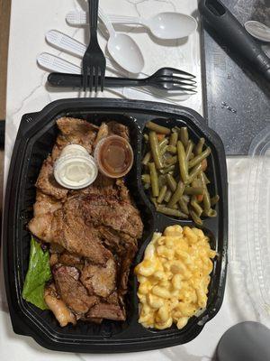 3 meat platter, green beans, Mac n cheese $34 w/ 2 forks, spoons and knives.