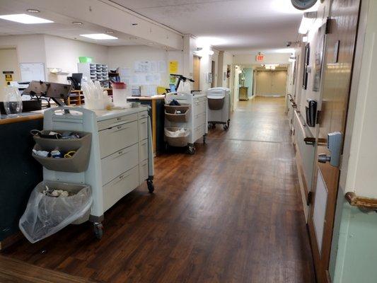 Medication carts all lined up. Nurses are absent. Must be a meeting