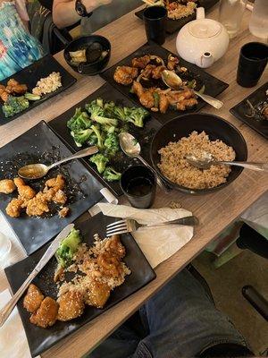 Kung Pao chicken , sesame chicken , and garlic broccoli
