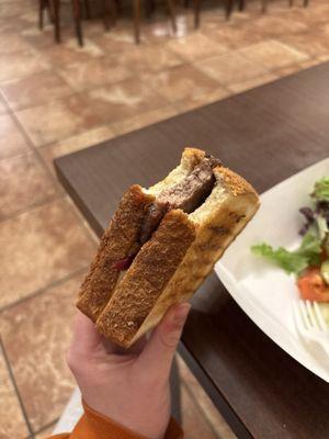 A "bacon cheese burger" that was offered.