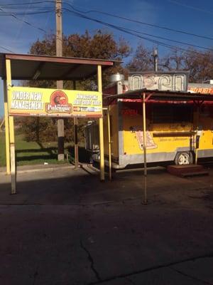 El Pollo Palenque's sign and rear of truck
