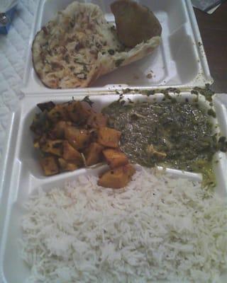 Clumpy rice, old potatoes, watery spinach and stale naan.