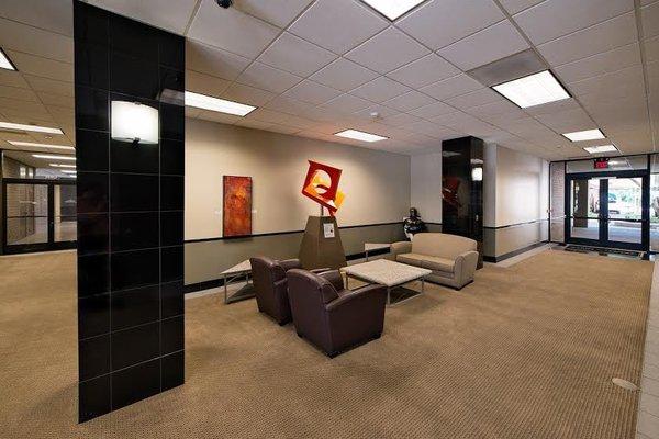Lobby of Ghuman Law Firm on 5th Floor with reception desk.