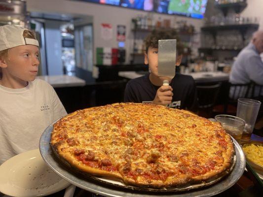 Pizza is classic tavern pizza ! It's delicious