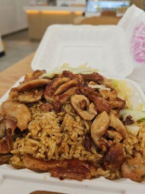 Chicken special over rice. Rice was a bit hard and the chicken was a bit gummy but the flavor was alright. OK for the price