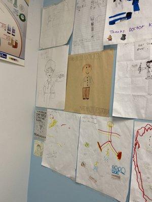 Pictures hanging in office of grateful patients. Wow. Impressed.