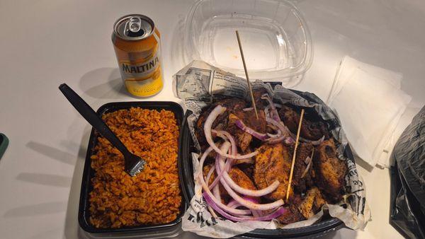 A side of Jollof and Chicken Suya