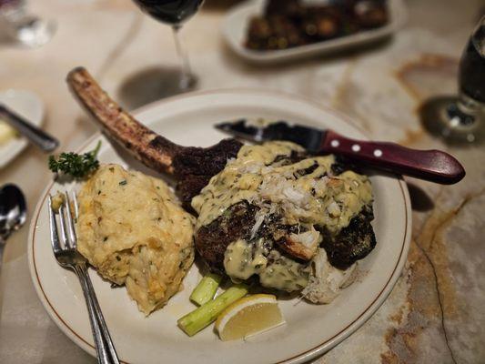 Bone in rib eye with "crab, asparagus, and Bernanke sauce" , lobster mashed potatoes