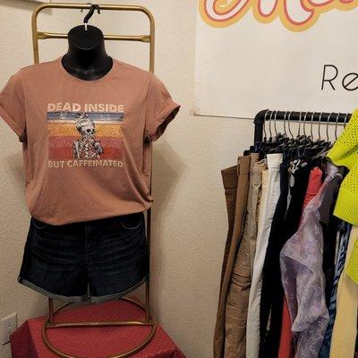 Hazel the mannequin wearing a sassy shirt inside More 2 Love Resale Boutique.