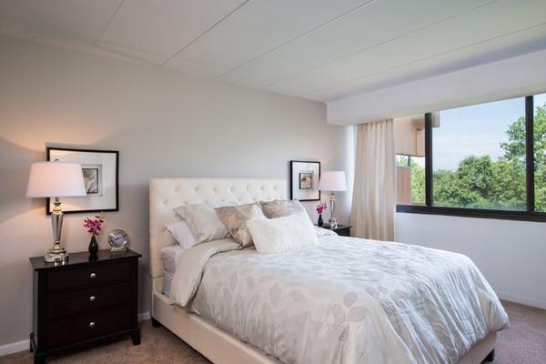 This bedroom is so inviting and comfortable.