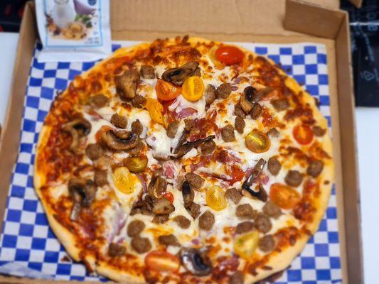 meat lovers with mashroom and cherry tomatoes