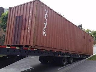 Delivery on Tilt bed roll off trailer