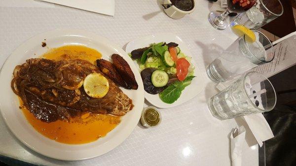 Red snapper special w/plantains. Comes w/rice & beans. Substituted a side salad. Large portion and cheaper price than most in the area.