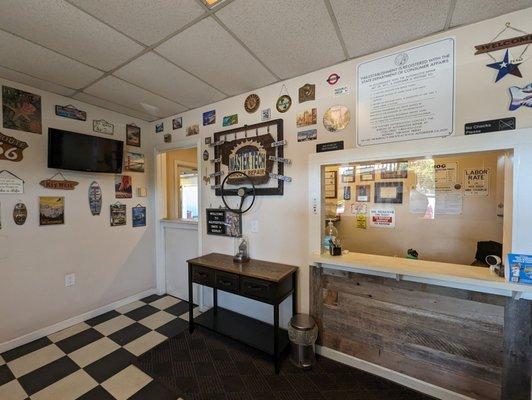 Simple clean check in area. Very cool and pleasant with AC on a hot day outside!