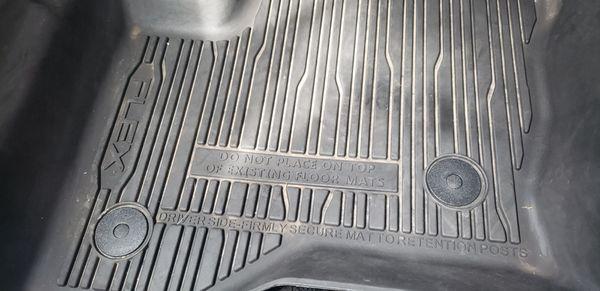 Filthy floor mats.
