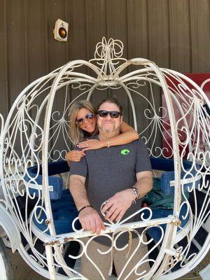 The hubs and myself inside of the carriage in front of the store!