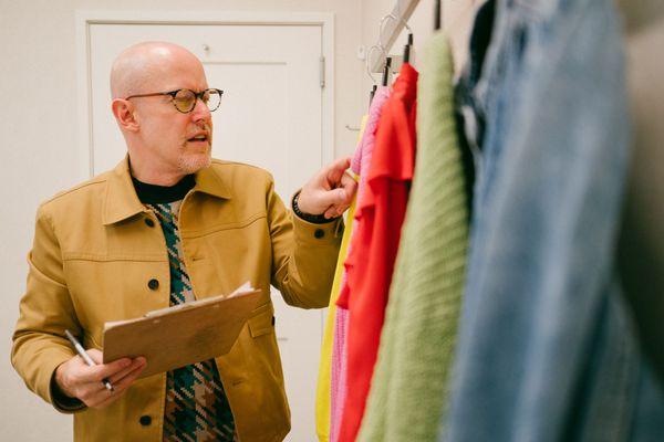 Preparing a fitting room for a client