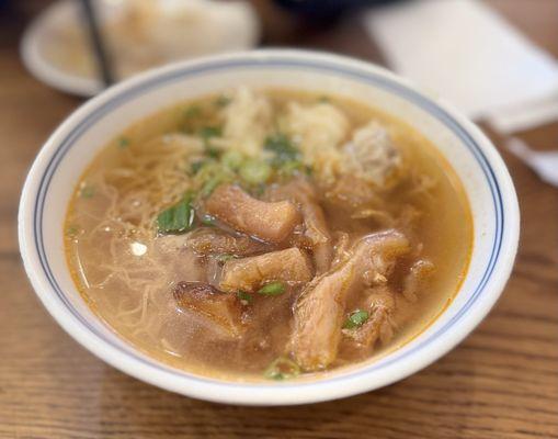 Beef tendon won tun noodle soup.