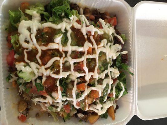 Asada fries with everything but the Kitchen Sink. Will feed 4 with a half Torta each.