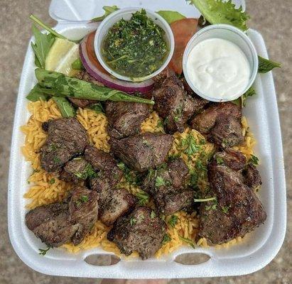 Shish Lamb kabob over rice