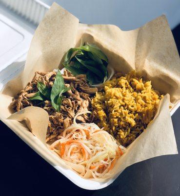 Hoi An turmeric rice and chicken & papaya salad