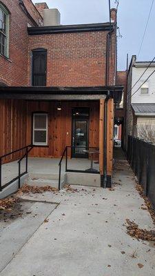 You can park in back, or park on Main Street and walk the short sidewalk to the entrance.