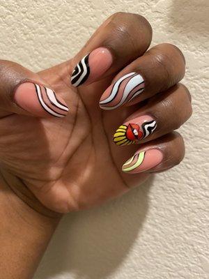 Psychedelic nail art by Aliyah, these are hand painted. No stickers over here baby!