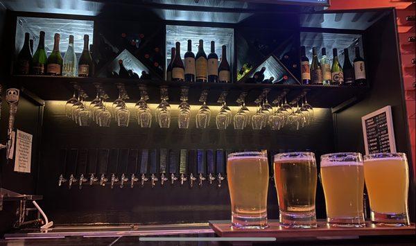 Many taps of craft beer and tasting sampler