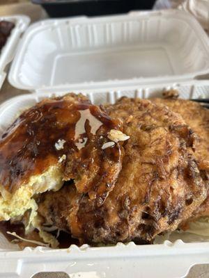 Egg Foo Young with sauce with side of fried rice or white rice