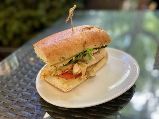 "Chicken Sandwich" (slow cooker chicken breast, banana pepper tartare, arugula, tomato on garlic bread)