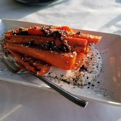 Roasted carrots with cumin yoghurt, nicoise olives, and zaatar spices at Ove Northwest