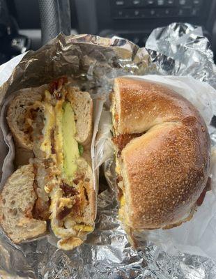 Bacon, Egg, Cheese, Hot Sauce, Avocado, Hash Brown Sandwich on multi-grain bagel.