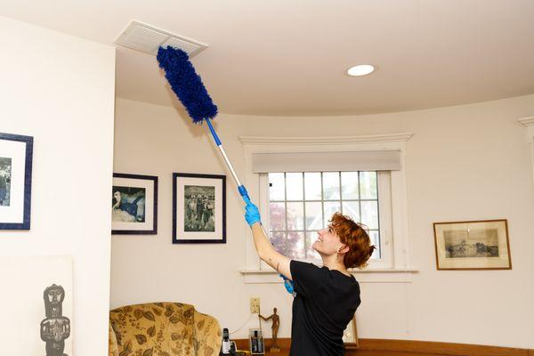 Top to bottom cleaning means we start with the ceiling and top corners of the room and work our way down so nothing is missed.