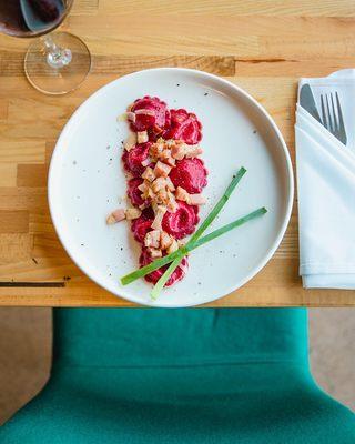 Beets ravioli with leek and pancetta
