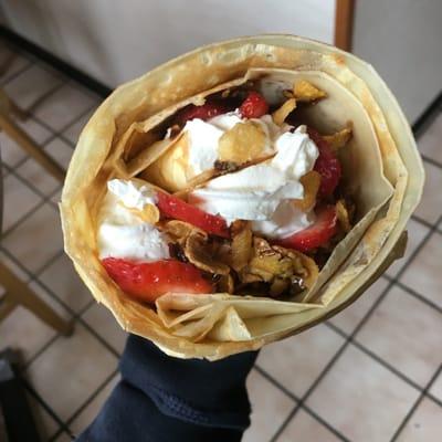 Strawberry crepe with Chocolate syrup, whip cream, and corn flakes!!