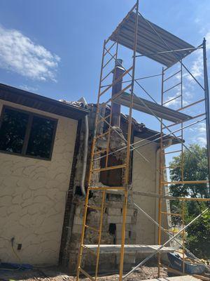 This Chimney was in need of repair. This is in the midst of the repair.