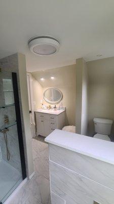 From 8x7 bathroom to 12x14 bathroom with bathtub and separate shower.