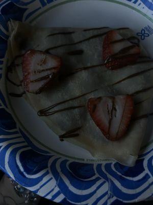 Crepe with chocolate and strawberries