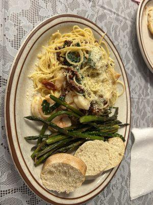 Shrimp scampi with grilled asparagus. This was at a dinner. She is only open occasionally for dinner.