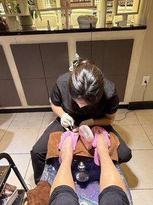 Theresa making my feet pretty