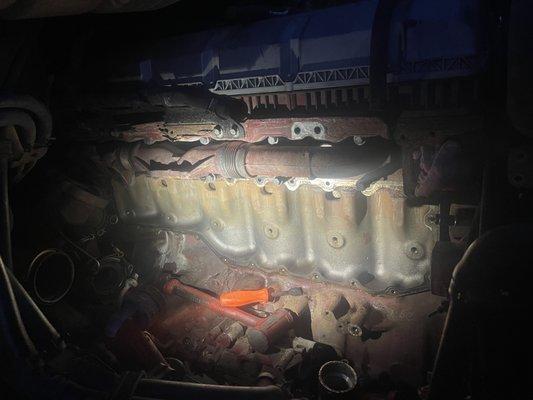 Mack MP8 oil cooler plate resealing.