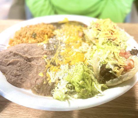 #1 - 2 enchiladas, two beef, puffy, tacos, beans, and rice.