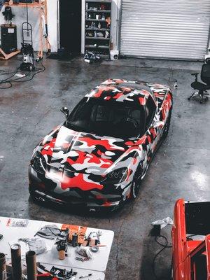 Full red tiger camo wrap install on this customer's supercharged Corvette.