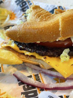 In this picture you can see the slice of meat compared to the french fry I had on the left